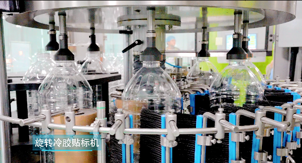 旋轉(zhuǎn)冷膠貼標機
